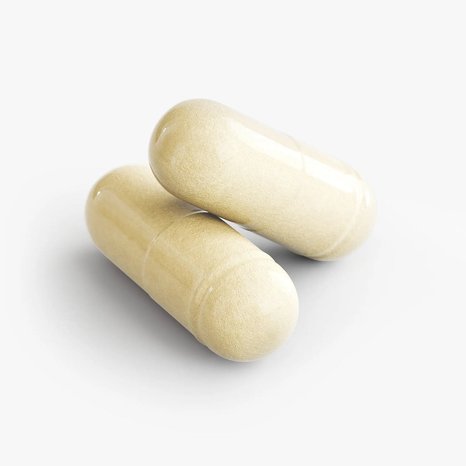 Two beige brain supplement for memory and focus capsules on a white background