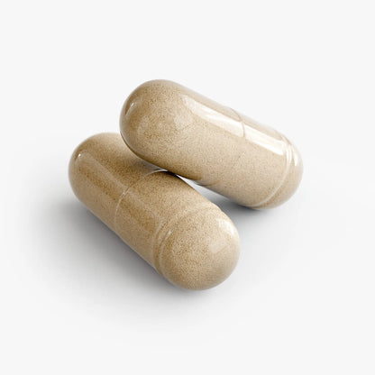 Two beige sleep aid supplement capsules on a white background